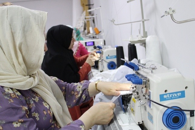 A couch with a lot of blanketsAI-generated content may be incorrect.