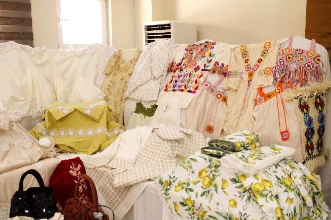 Women sewing machines in a factoryAI-generated content may be incorrect.