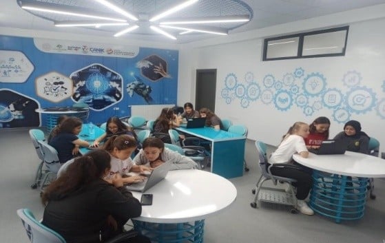 A group of people in a classroomAI-generated content may be incorrect.