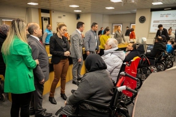 A group of people in wheelchairsAI-generated content may be incorrect.